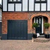 Image shows garage extension after the mismatched bricks that it was built with have been tinted with Total Wall Care brick tint.