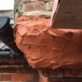 Repair mortar applied in layers for deep brick repair