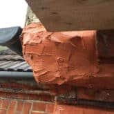 Repair mortar applied in layers for deep brick repair
