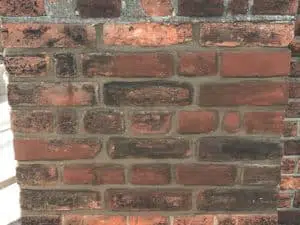 Brick tinting applied to age bricks