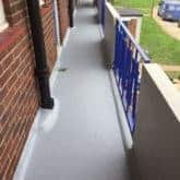 Resurfaced walkway with waterproofing membrane