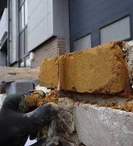 iamge showing brick being repaired