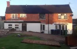Work begins on adding extension to period cottage and restoring brick facade