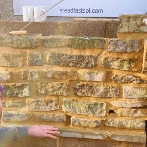Random stone wall repaired with HelicalFix system