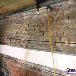 Lintel repair using helical bar