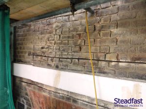 Lintel repair using helical bar